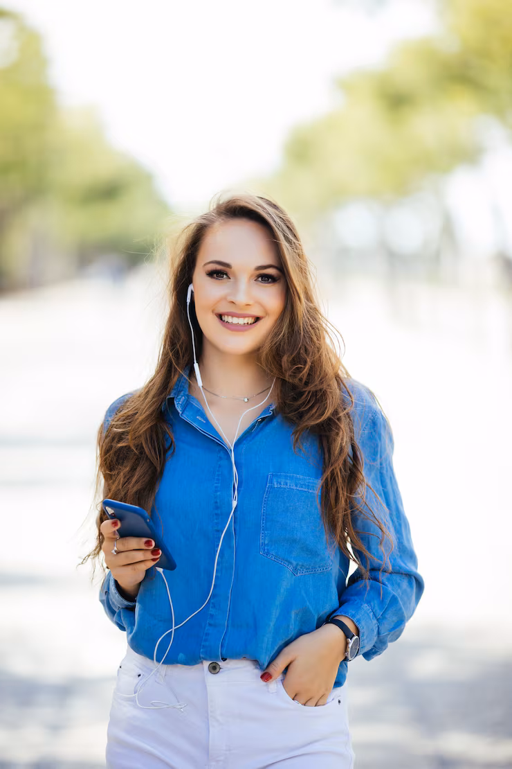 portrait happy smiling woman standing square sunny summer spring day outside cute smiling woman looking you attractive young girl enjoying summer filtered image flare sunshine 231208 6734
